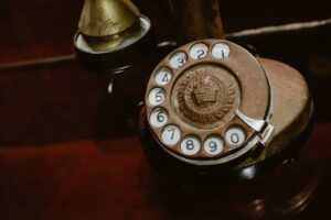 Close up of an antique rotary dial telephone