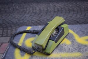 green and gray puncher on gray textile