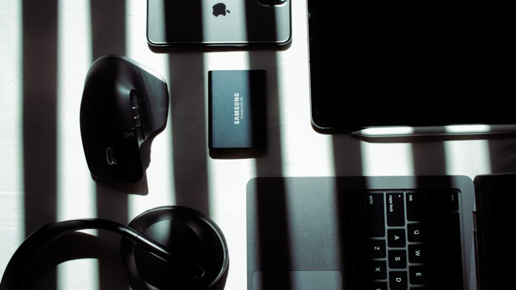 black samsung android smartphone on black and silver computer keyboard