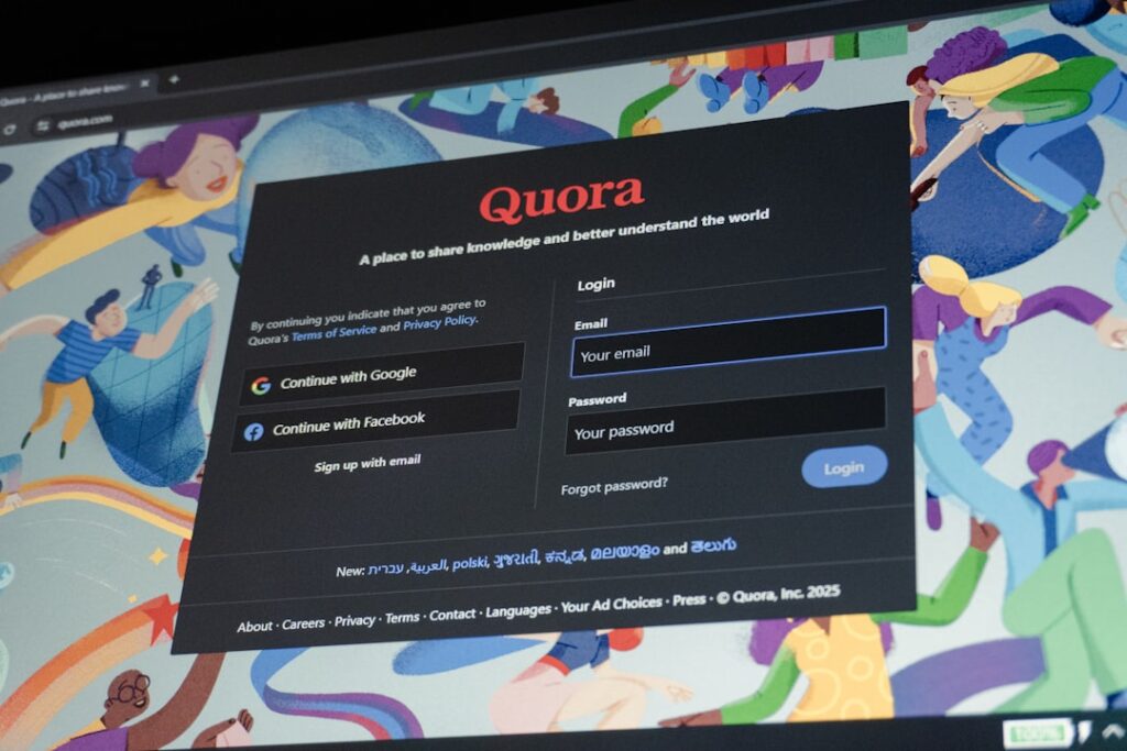 Quora login screen with email and password fields.